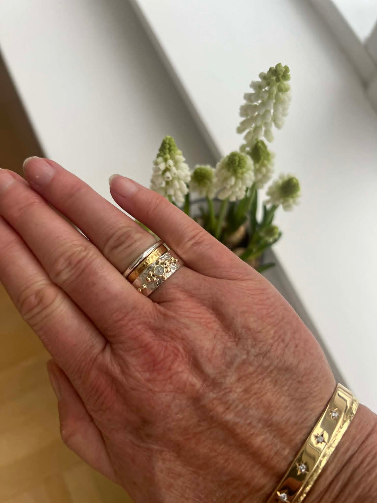 Ring kombi af guld og sølv